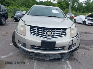 2014 Cadillac SRX Performance Collection z VIN 3GYFNCE35ES610504, wystawiony jako IAAI lot #42133548 z przebiegiem 140 306 mil mil oraz . Historia ofert i sprzedaży dostępna na DreamBid. Obrazek 12.