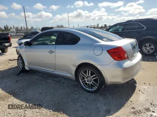 2005 Scion tC with VIN JTKDE177650059937, listed as a Copart auction lot 56122335 with 181,256 mi miles and Salvage Title. Bid and sale history available at DreamBid. Image 2.