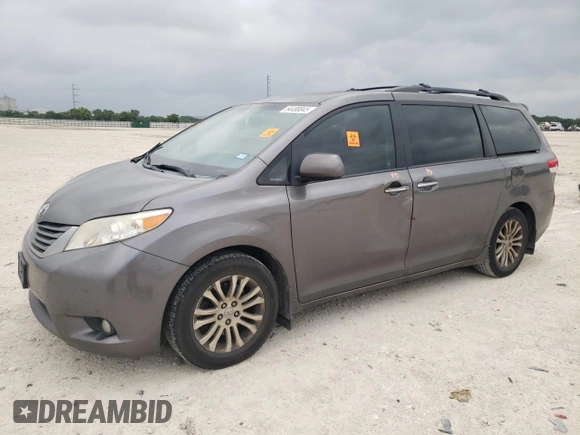 2014 Toyota Sienna XLE with VIN 5TDYK3DC2ES510647, listed as a Copart auction lot 54488845 with 216,091 mi miles and Salvage Title. Bid and sale history available at DreamBid. Image 1.