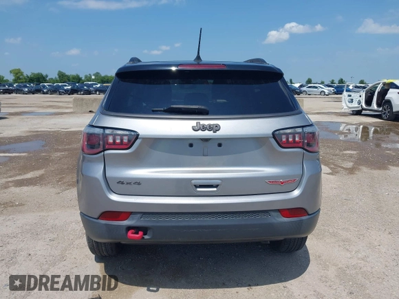 2018 Jeep Compass Trailhawk with VIN 3C4NJDDB2JT198784, listed as a IAAI auction lot 42405539 with 121,553 mi miles and . Bid and sale history available at DreamBid. Image 17.