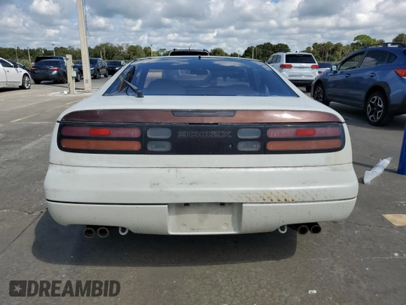 1991 Nissan 300ZX z VIN JN1RZ26H3MX504127, wystawiony jako Copart lot #74052424 z przebiegiem 48 904 mil mil oraz Szkody całkowita. Historia ofert i sprzedaży dostępna na DreamBid. Obrazek 6.