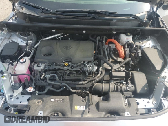 2023 Toyota RAV4 Hybrid XLE with VIN JTMRWRFV7PD166743, listed as a Copart auction lot 59964505 with 87,404 mi miles and Salvage title. Bid and sale history available at DreamBid. Image 12.