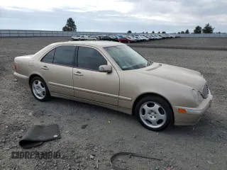 2001 Mercedes-Benz E-Class with VIN WDBJF70JX1B220786, listed as a Copart auction lot 71808344 with 94,476 mi miles and Salvage Title. Bid and sale history available at carsss.com. Image 4.