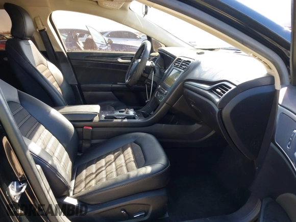 2018 Ford Fusion SE z VIN 3FA6P0H77JR180057, wystawiony jako IAAI lot #41729451 z przebiegiem 122 200 mil mil oraz . Historia ofert i sprzedaży dostępna na DreamBid. Obrazek 5.