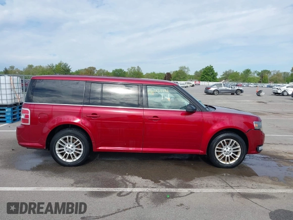 2014 Ford Flex SEL z VIN 2FMGK5C82EBD23183, wystawiony jako IAAI lot #42223191 z przebiegiem 221 048 mil mil oraz . Historia ofert i sprzedaży dostępna na DreamBid. Obrazek 13.
