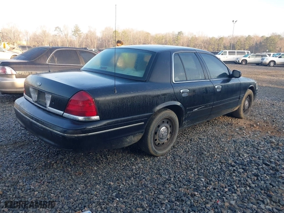 2005 Ford Crown Victoria LX with VIN 2FAFP74W45X127975, listed as a IAAI auction lot 41521670 with 289,438 mi miles. Bid and sale history available at carsss.com. Image 4.