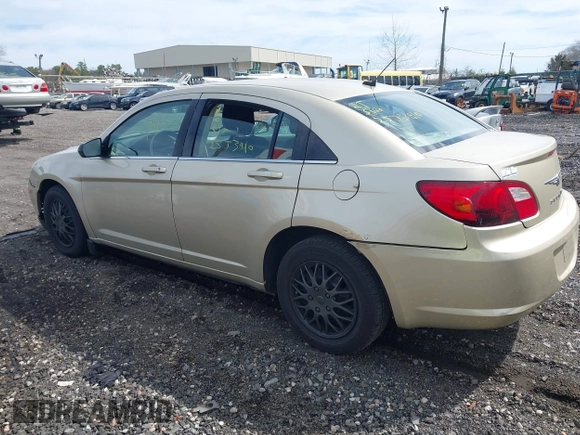 2010 Chrysler Sebring Touring z VIN 1C3CC4FB8AN187095, wystawiony jako IAAI lot #42032541 z przebiegiem 189 971 mil mil oraz . Historia ofert i sprzedaży dostępna na DreamBid. Obrazek 3.