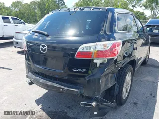 2012 Mazda CX-9 Touring with VIN JM3TB2CA1C0350658, listed as a IAAI auction lot 39571490 with 168,883 mi miles. Bid and sale history available at carsss.com. Image 12.