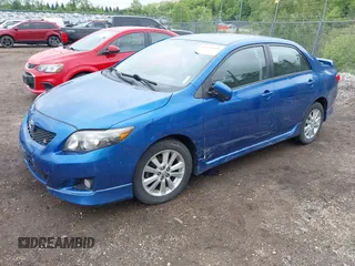 2010 Toyota Corolla with VIN 1NXBU4EEXAZ180439, listed as a IAAI auction lot 42373443 with 162,215 mi miles and . Bid and sale history available at DreamBid. Image 2.