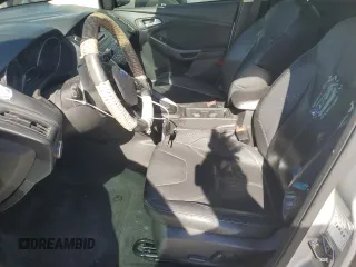 2015 Ford Focus SE z VIN 1FADP3F25FL283595, wystawiony jako Copart lot #57966705 z przebiegiem 182 405 mil mil oraz Szkoda całkowita • Salvage title. Historia ofert i sprzedaży dostępna na DreamBid. Obrazek 7.