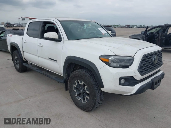 2022 Toyota Tacoma SR z VIN 3TMCZ5AN7NM493268, wystawiony jako IAAI lot #42041593 z przebiegiem 100 589 mil mil oraz . Historia ofert i sprzedaży dostępna na DreamBid. Obrazek 1.