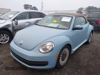2015 Volkswagen Beetle 1.8T w/Tech with VIN 3VW517AT9FM802294, listed as a IAAI auction lot 41516005 with 110,184 mi miles and . Bid and sale history available at DreamBid. Image 2.