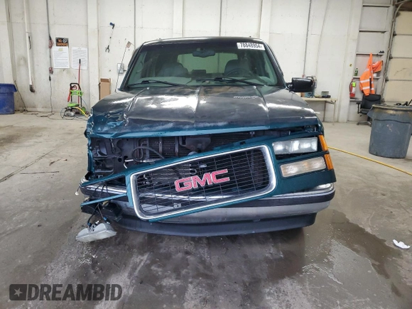 1998 GMC Yukon with VIN 1GKEC13RXWJ731667, listed as a Copart auction lot 78848954 with 202,164 mi miles and Salvage Title. Bid and sale history available at carsss.com. Image 5.