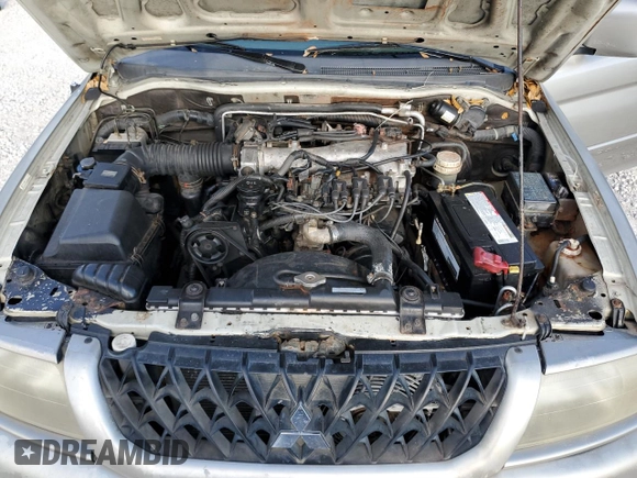 2002 Mitsubishi Montero z VIN JA4MT41R62J021195, wystawiony jako Copart lot #47021115 z przebiegiem 196 795 mil mil oraz Szkoda całkowita • Salvage title. Historia ofert i sprzedaży dostępna na DreamBid. Obrazek 12.