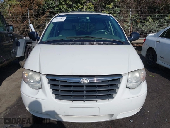2006 Chrysler Town & Country Touring with VIN 2A8GP54L56R671585, listed as a IAAI auction lot 41475419 with 166,861 mi miles and . Bid and sale history available at DreamBid. Image 12.