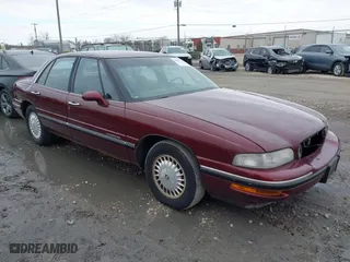 1999 Buick LeSabre Custom with VIN 1G4HP52K1XH400585, listed as a IAAI auction lot 41894706 with 142,884 mi miles. Bid and sale history available at carsss.com. Image 1.