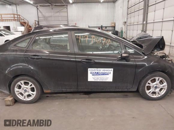 2014 Ford Fiesta SE with VIN 3FADP4BJ9EM212156, listed as a IAAI auction lot 41791690 with 92,760 mi miles and . Bid and sale history available at DreamBid. Image 14.