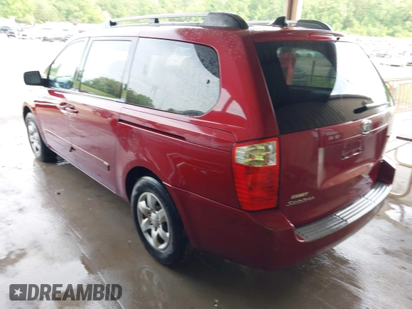 2009 Kia Sedona LX with VIN KNDMB233X96277536, listed as a IAAI auction lot 42108653 with 260,258 mi miles. Bid and sale history available at carsss.com. Image 3.