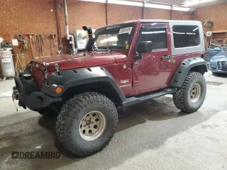 2007 Jeep Wrangler Sahara z VIN 1J4FA54127L132543, wystawiony jako Copart lot #55891995 z przebiegiem 74 616 mil mil oraz Szkoda całkowita • Salvage title. Historia ofert i sprzedaży dostępna na DreamBid. Obrazek 1.