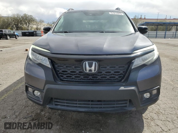 2020 Honda Passport Touring z VIN 5FNYF8H9XLB007336, wystawiony jako Copart lot #51012975 z przebiegiem 74 620 mil mil oraz Szkoda całkowita • Salvage title. Historia ofert i sprzedaży dostępna na DreamBid. Obrazek 5.