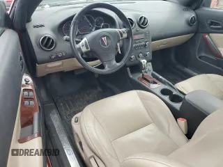 2006 Pontiac G6 with VIN 1G2ZH368564274587, listed as a Copart auction lot 72696594 with 156,311 mi miles and Salvage title. Bid and sale history available at DreamBid. Image 8.