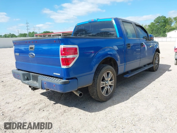 2014 Ford F-150 XL with VIN 1FTEW1CM9EFA37657, listed as a IAAI auction lot 42014824 with 235,969 mi miles. Bid and sale history available at carsss.com. Image 4.