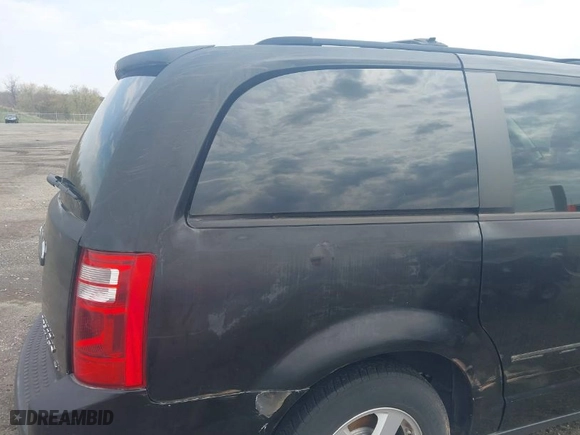 2010 Dodge Grand Caravan SXT with VIN 2D4RN5D11AR201781, listed as a IAAI auction lot 42028688 with 147,563 mi miles. Bid and sale history available at carsss.com. Image 6.