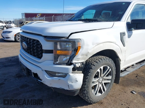 2023 Ford F-150 XL with VIN 1FTFW1E5XPKE92229, listed as a IAAI auction lot 41686774 with 58,008 mi miles. Bid and sale history available at carsss.com. Image 6.