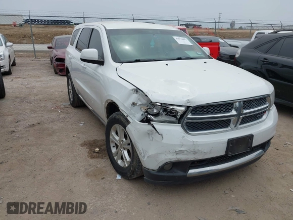 2013 Dodge Durango SXT z VIN 1C4RDHAG4DC598250, wystawiony jako IAAI lot #42076002 z przebiegiem 104 701 mil mil oraz . Historia ofert i sprzedaży dostępna na DreamBid. Obrazek 1.