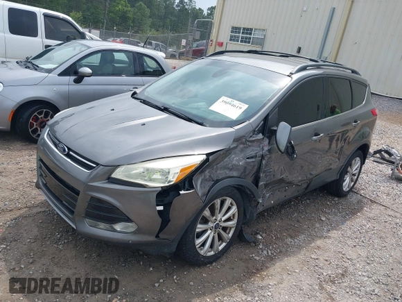2013 Ford Escape SEL with VIN 1FMCU0HX4DUC83404, listed as a IAAI auction lot 41285095 with 199,024 mi miles. Bid and sale history available at carsss.com. Image 2.