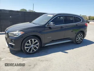 2017 BMW X1 sDrive28i z VIN WBXHU7C3XHP924571, wystawiony jako Copart lot #52515465 z przebiegiem 140 778 mil mil oraz Nie do naprawy • Non repairable. Historia ofert i sprzedaży dostępna na DreamBid. Obrazek 1.