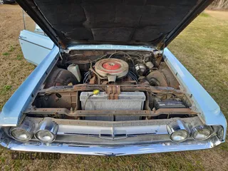 1964 Oldsmobile 88 z VIN 854M274413, wystawiony jako Copart lot #48237445 z przebiegiem 45 480 mil mil oraz Tytuł czysty. Historia ofert i sprzedaży dostępna na DreamBid. Obrazek 7.