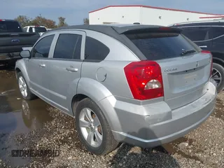 2011 Dodge Caliber Mainstreet with VIN 1B3CB3HA7BD168429, listed as a IAAI auction lot 41035025 with 155,614 mi miles and . Bid and sale history available at DreamBid. Image 3.