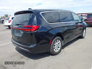 2023 Chrysler Pacifica Touring L with VIN 2C4RC1BG7PR510912, listed as a IAAI auction lot 41967473 with 67,907 mi miles and . Bid and sale history available at DreamBid. Image 4.