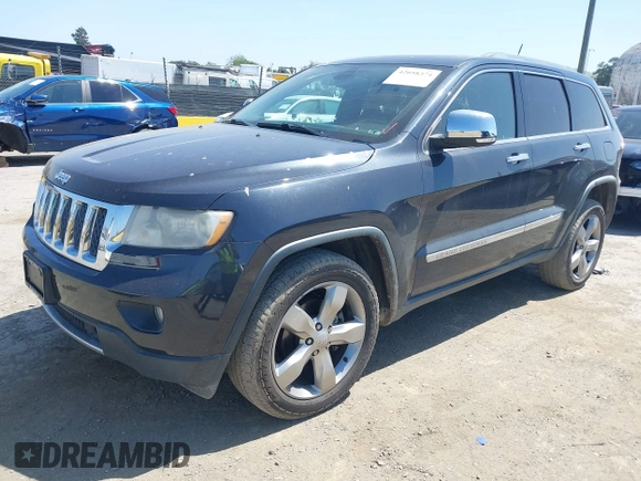 2013 Jeep Grand Cherokee Overland with VIN 1C4RJECT8DC534021, listed as a IAAI auction lot 42058374 with 137,289 mi miles. Bid and sale history available at carsss.com. Image 17.