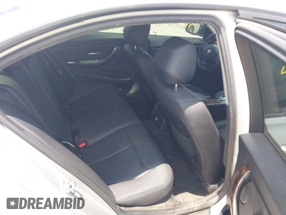 2013 BMW 3 Series 328i with VIN WBA3C1G5XDNR45054, listed as a IAAI auction lot 42504007 with 152,705 mi miles and . Bid and sale history available at DreamBid. Image 8.