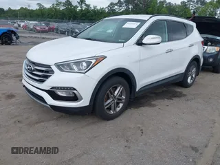 2018 Hyundai Santa Fe 2.4L z VIN 5XYZUDLB1JG543837, wystawiony jako IAAI lot #42235471 z przebiegiem 157 909 mil mil oraz . Historia ofert i sprzedaży dostępna na DreamBid. Obrazek 17.