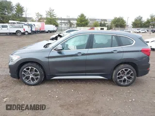 2021 BMW X1 xDrive28i with VIN WBXJG9C06M5S05303, listed as a IAAI auction lot 41060130 with 29,644 mi miles. Bid and sale history available at carsss.com. Image 15.