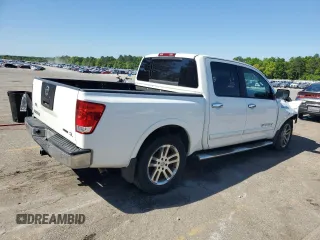 2012 Nissan Titan SV with VIN 1N6BA0ED9CN302103, listed as a Copart auction lot 52678495 with 214,564 mi miles and Salvage title. Bid and sale history available at DreamBid. Image 3.