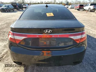 2012 Hyundai Azera z VIN KMHFH4JG0CA161867, wystawiony jako Copart lot #86928654 z przebiegiem 243 946 mil mil oraz Czysty tytuł • Clean title. Historia ofert i sprzedaży dostępna na DreamBid. Obrazek 6.