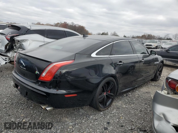 2014 Jaguar XJ with VIN SAJWA2EKXEMV64494, listed as a Copart auction lot 82634004 with 119,811 mi miles and Clean title. Bid and sale history available at DreamBid. Image 3.