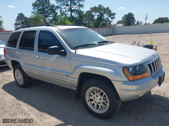 2002 Jeep Grand Cherokee Limited with VIN 1J8GW58S62C253818, listed as a IAAI auction lot 41983592 with 165,378 mi miles. Bid and sale history available at carsss.com. Image 6.