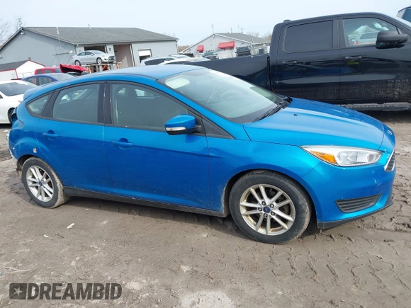 2015 Ford Focus SE with VIN 1FADP3K20FL383433, listed as a IAAI auction lot 42018563 with 101,789 mi miles. Bid and sale history available at carsss.com. Image 14.