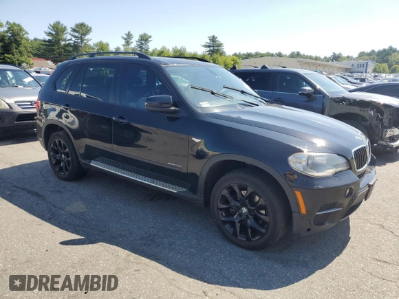 2012 BMW X5 35i with VIN 5UXZV4C54CL752079, listed as a Copart auction lot 62147515 with 147,244 mi miles and Clean title. Bid and sale history available at DreamBid. Image 4.