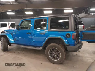 2021 Jeep Wrangler Unlimited Sport S with VIN 1C4HJXDN5MW717673, listed as a IAAI auction lot 42210527 with 35,635 mi miles and . Bid and sale history available at DreamBid. Image 3.