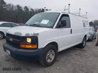 2011 Chevrolet Express Cargo Van with VIN 1GCWGFCAXB1190710, listed as a IAAI auction lot 41313842 with 174,960 mi miles. Bid and sale history available at carsss.com. Image 20.
