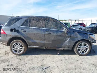 2014 Mercedes-Benz M-Class ML 350 with VIN 4JGDA5JB2EA319263, listed as a IAAI auction lot 41464225 with 169,292 mi miles. Bid and sale history available at carsss.com. Image 14.