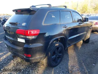 2015 Jeep Grand Cherokee Altitude with VIN 1C4RJFAG6FC796571, listed as a IAAI auction lot 41258471 with 104,049 mi miles. Bid and sale history available at carsss.com. Image 4.