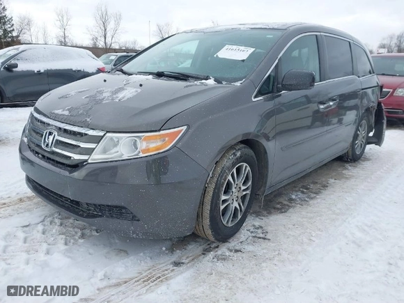 2013 Honda Odyssey EX-L with VIN 5FNRL5H65DB055040, listed as a IAAI auction lot 41615182 with 246,225 mi miles. Bid and sale history available at carsss.com. Image 2.