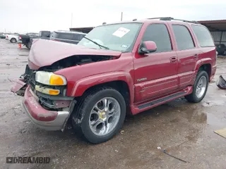 2005 GMC Yukon SLT with VIN 1GKEC13T85J178091, listed as a IAAI auction lot 41340788 with 160,587 mi miles. Bid and sale history available at carsss.com. Image 2.